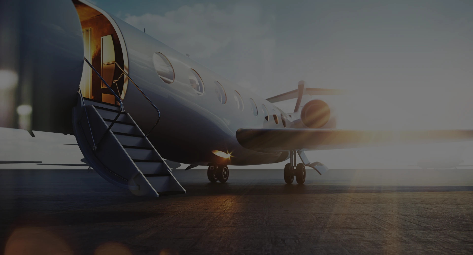 private jet awaits the owner at sunset on airport runway